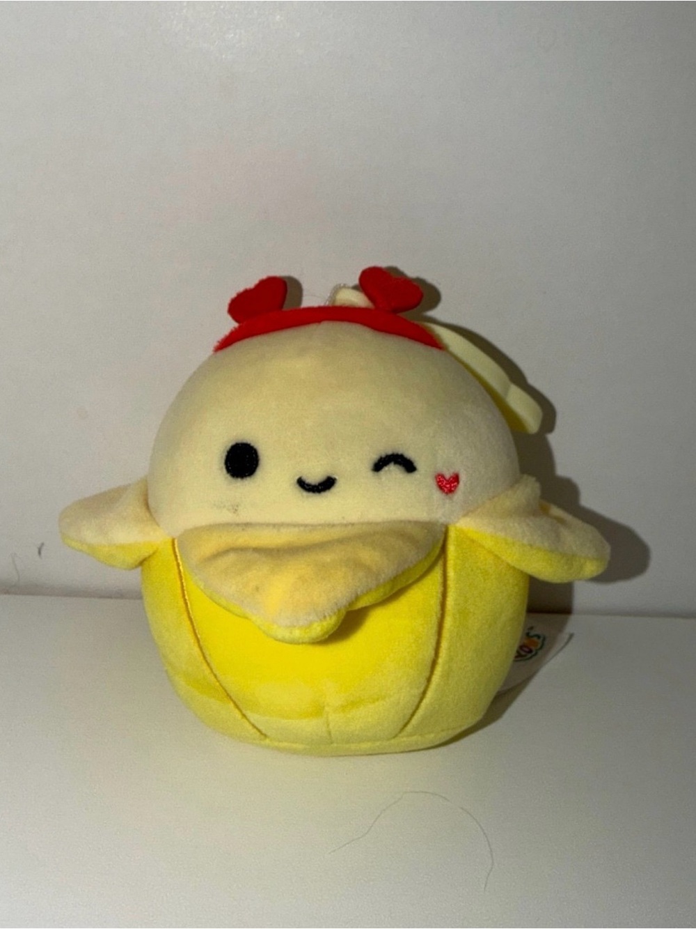 Junie Squishmallows Yellow Banana Plush with Red Heart Headband 3.5” keychain